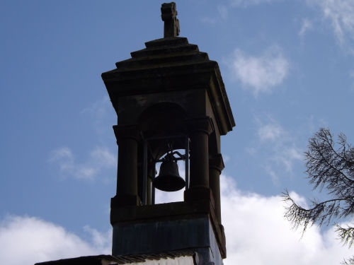 The Hall's small bell tower against the sky